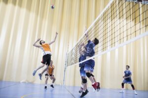 Man jumping during a volleyball match