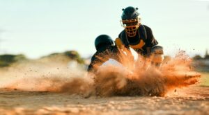 A baseball player sliding into base, finally safe after an intense and dramatic game. A shortstop t